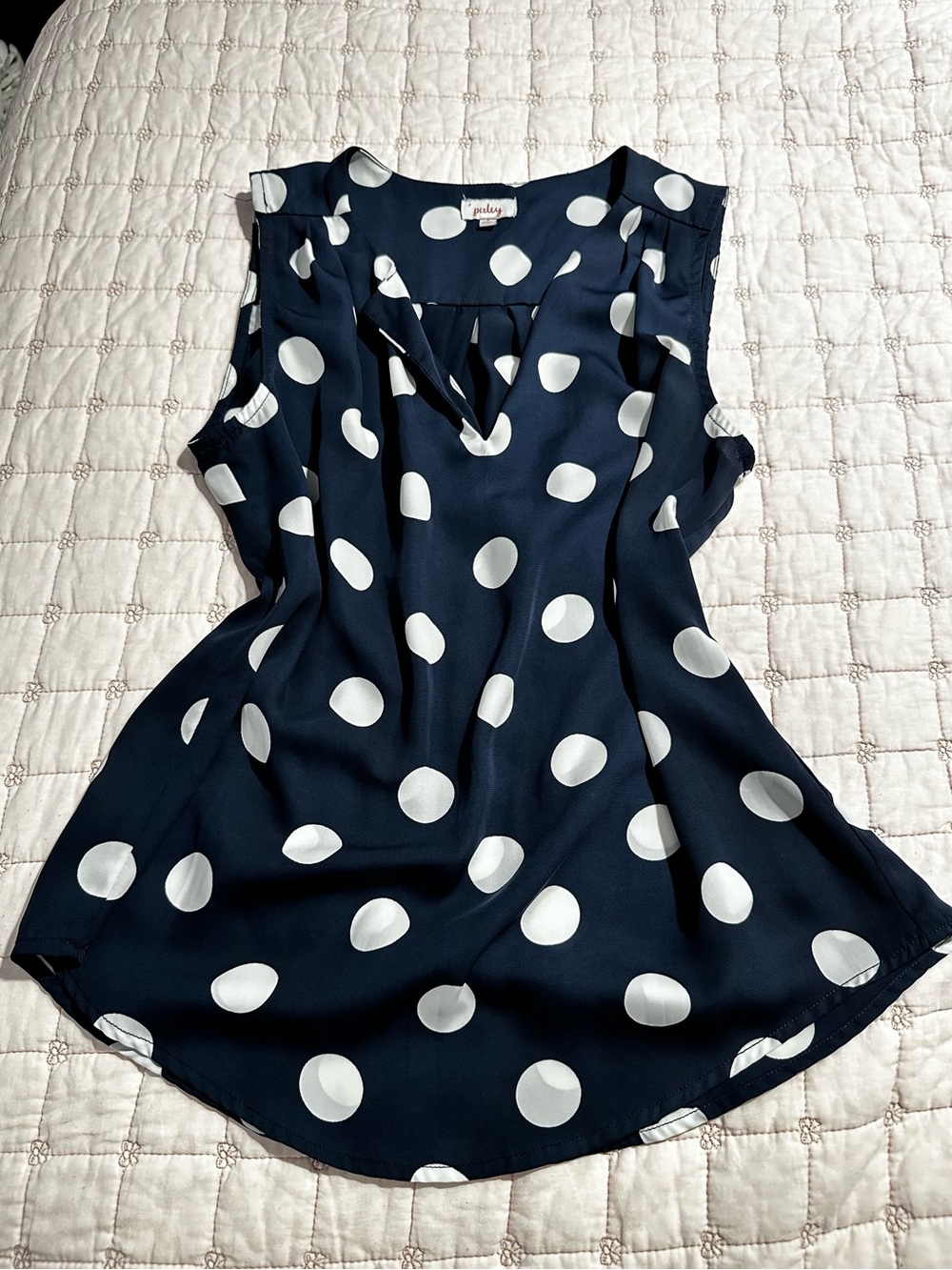 Pixley Navy and White Polka Dot Sleeveless V-Neck Blouse